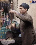 عکسی از نمایش خیمه شب بازی در دوران قاجار