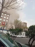 آتش‌سوزی یک ساختمان در بلوار کشاورز /عکس