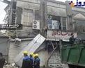 کسبه در حال تخلیه ساختمان مجاور  پلاسکو + عکس