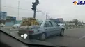 عکس/ حمل عجیب آجر و سیمان با خودروی سواری!