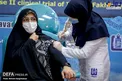 همسر شهید رضایی نژاد داوطلب تزریق واکسن ایرانی «فخرا» + عکس