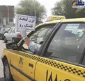 عکس/ توصیه راننده تاکسی به دیگر رانندگان در ترافیک روزهای کرونایی!