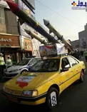 عکس/ تاکسی حمل موشک در راهپیمایی روز 22 بهمن