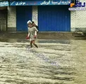 تصویری دیدنی از پدربزرگ اهوازی در بارندگی