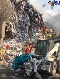 عکس/ بقاياي پارچه ها و لباس ها در آوار پلاسکو