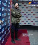 نوید محمدزاده با لباس نظامی و پرچم آلمان در جشنواره فجر!+عکس