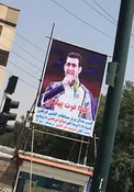 نصب بیلبورد برای تقدیر از کشتی گیر ایرانی تیم ملی آذربایجان ! + عکس